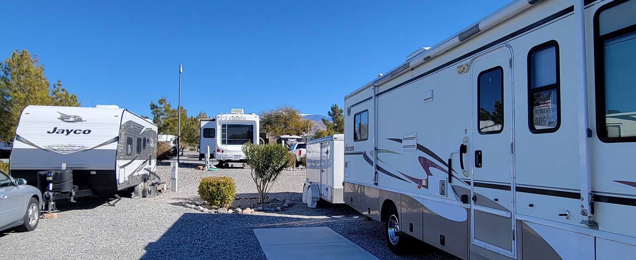 Three RVs in campground